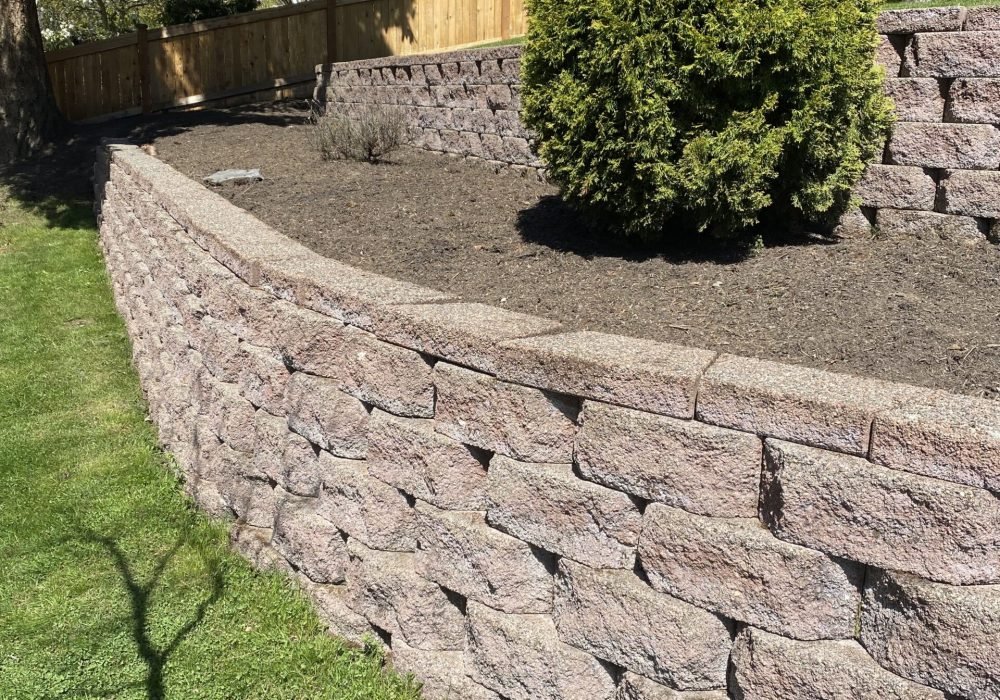 Clean stone retaining wall landscaping