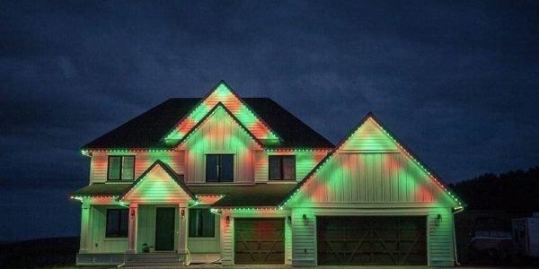 House decorated with red and green lights