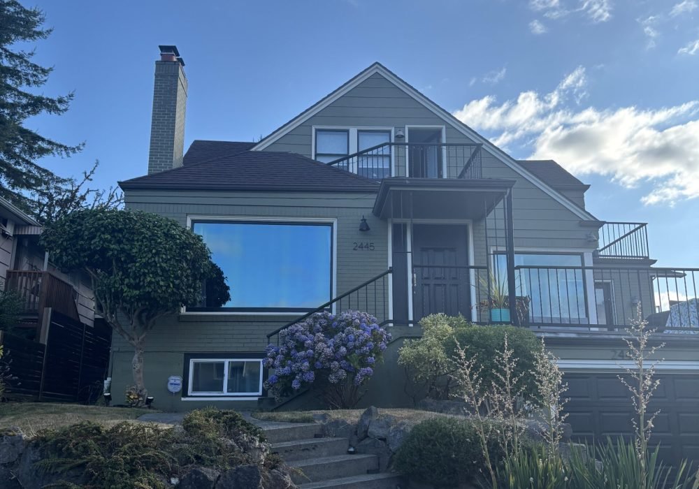 Two story house with stone steps